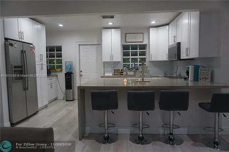 Gorgeous fully remodeled 3-bed, 2-bath home ideally located at 771 E 35th St, directly across from an elementary school in the heart of Hialeah! Stunning updated bathrooms, elegant wood flooring, and an inviting backyard featuring a spacious aluminum-covered patio—perfect for entertaining or relaxing year-round. Prime location, turnkey ready—your dream home awaits!