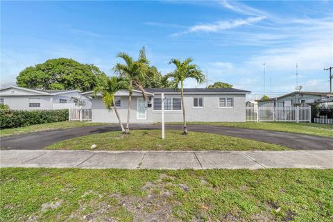 Photo of 911 NW 200th Ter, Miami Gardens, FL 33169 (MLS # A11950414)