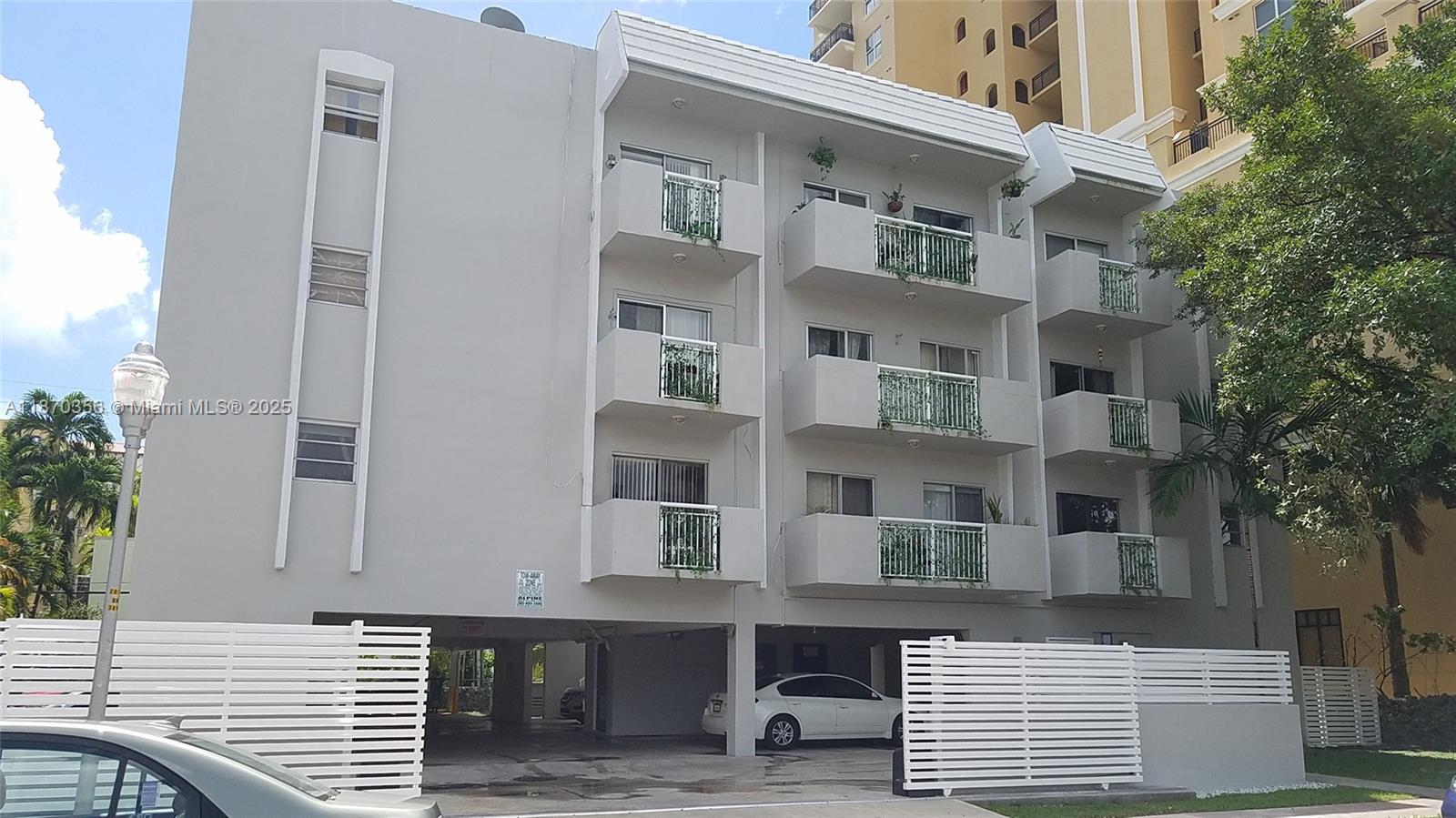 Spacious unit in a secure boutique building with new stainless steel appliances, private balcony, and assigned parking. Amenities include a large pool, security cameras, electric gate, and on-site laundry. Quiet residential street. Just two blocks from Publix, one block from Target, close to Phillips Park, and surrounded by great restaurants and cafes.