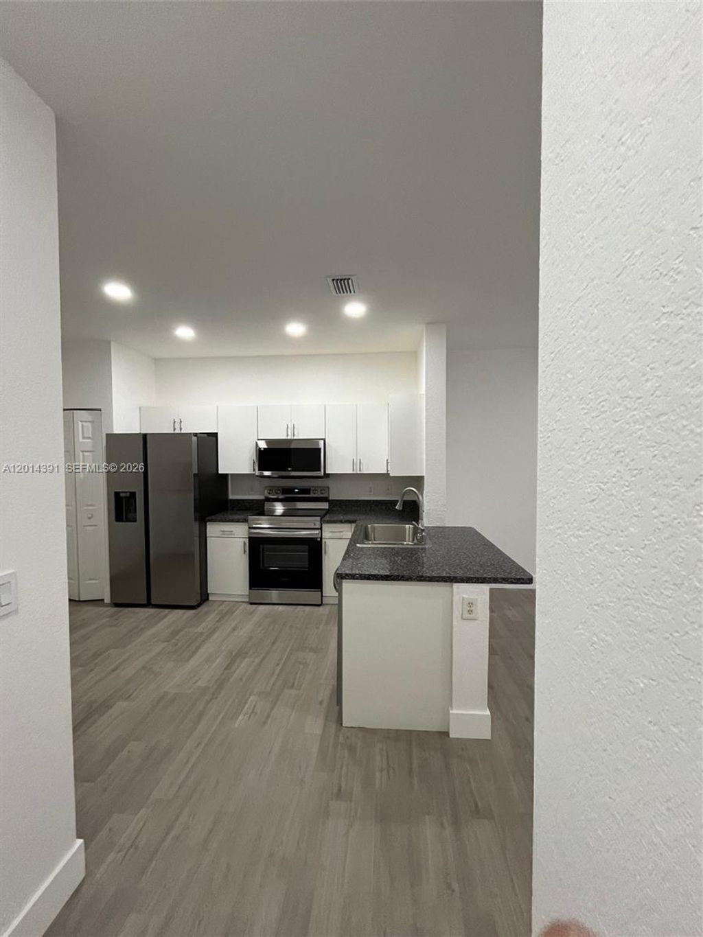 Photo of 2216 Ensenada Ter, Weston, FL 33327 (MLS # A12014391)