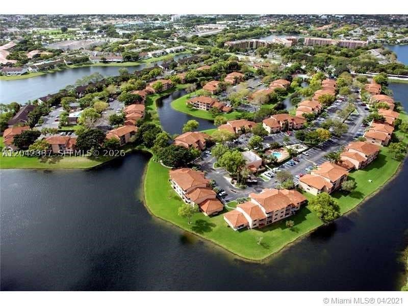 Photo of 9877 Nob Hill Ln #9877, Sunrise, FL 33351 (MLS # A12042337)