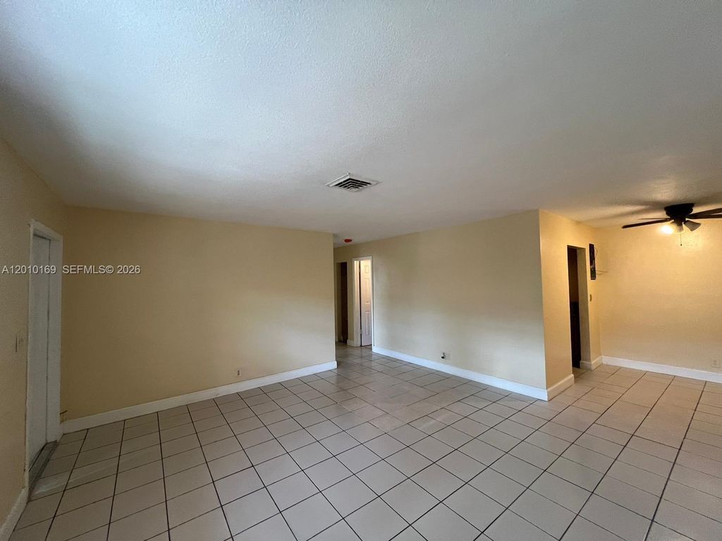 Photo of 5411 NW 22nd St #5411, Lauderhill, FL 33313 (MLS # A12010169)