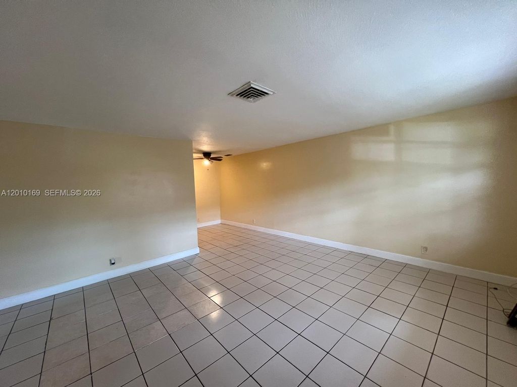 Photo of 5411 NW 22nd St #5411, Lauderhill, FL 33313 (MLS # A12010169)