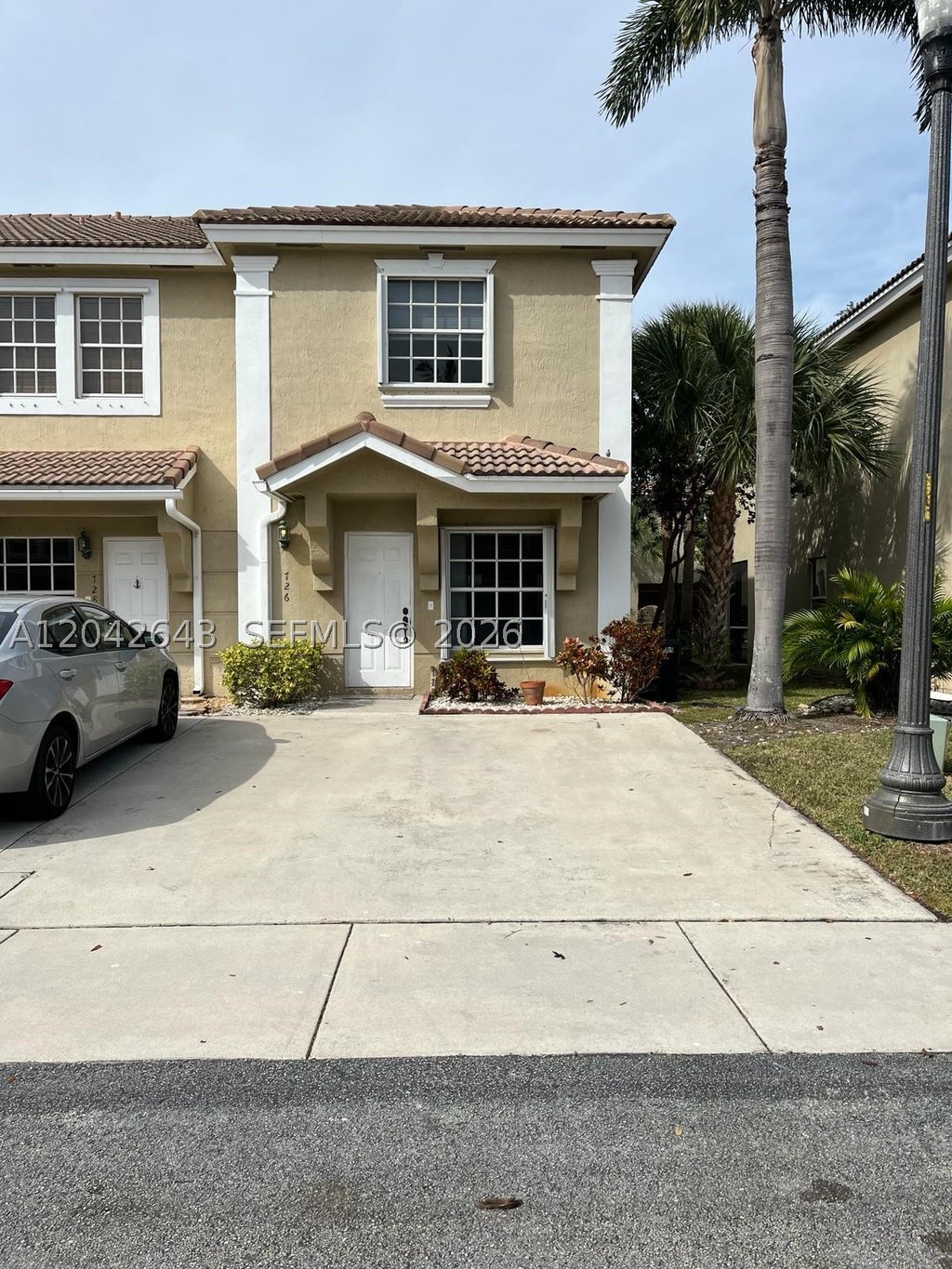 Photo of 726 SW 122nd Ave #726, Pembroke Pines, FL 33025 (MLS # A12042643)
