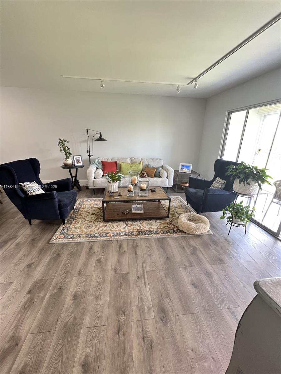 Enjoy your morning coffee on the balcony overlooking the golf course! This exquisite condominium features two bright bedrooms, two spacious bathrooms, and a kitchen with premium stainless steel appliances, wood cabinetry, and quartz countertops. Vinyl flooring and an in-unit washer and dryer are featured. The Homeowners Association (HOA) includes endless activities and amenities in the multi-million-dollar clubhouse. This vibrant 55+ community offers an indoor pool, outdoor pool, hot tub, shuffleboard, billiards room, game room, fitness center, sauna, tennis courts, a large theater with shows, complimentary transportation, and much more. Shopping, restaurants, and medical centers are easily accessible. Don't miss this opportunity!