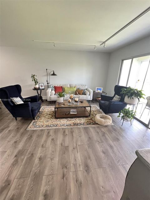 Photo of 12601 SW 13th St #304G, Pembroke Pines, FL 33027 (MLS # A11884150)
