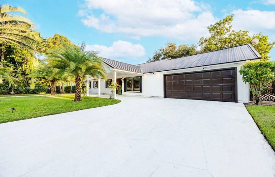 Unique opportunity to own a piece of paradise. Beautiful and exclusive property sitting a cul de sac, with a deck to the canal on the back, on the heart of Lake Clarke Shores, special for those water sports enthusiasts, HUGE backyard ready for this family and friend reunions, completely updated this beauty is ready to move in, just bring the toothbrush. Roof was replaced on 2024. Furniture and jet sky are negotiable. Measurements are approximate to be verified by buyers.