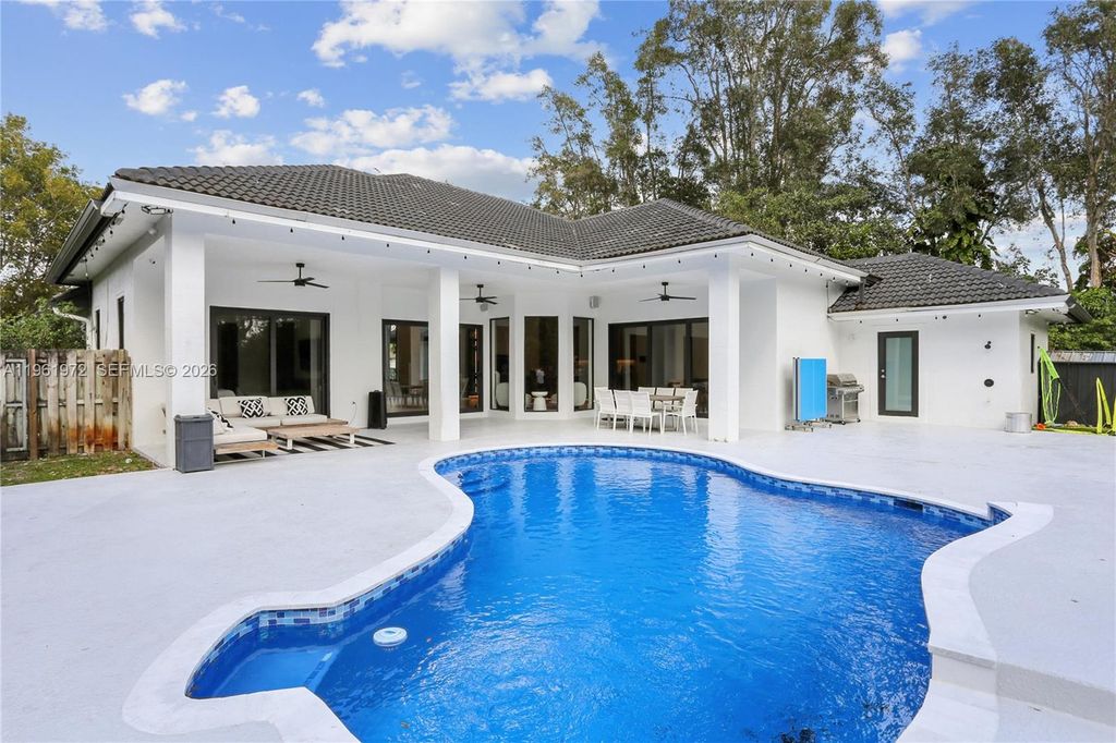 Photo of 12100 NW 21st Ct, Plantation, FL 33323 (MLS # A11961972)