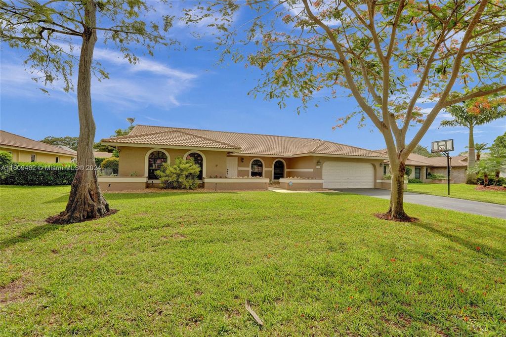 Photo of 5081 NW 86th Way, Coral Springs, FL 33067 (MLS # A11609462)