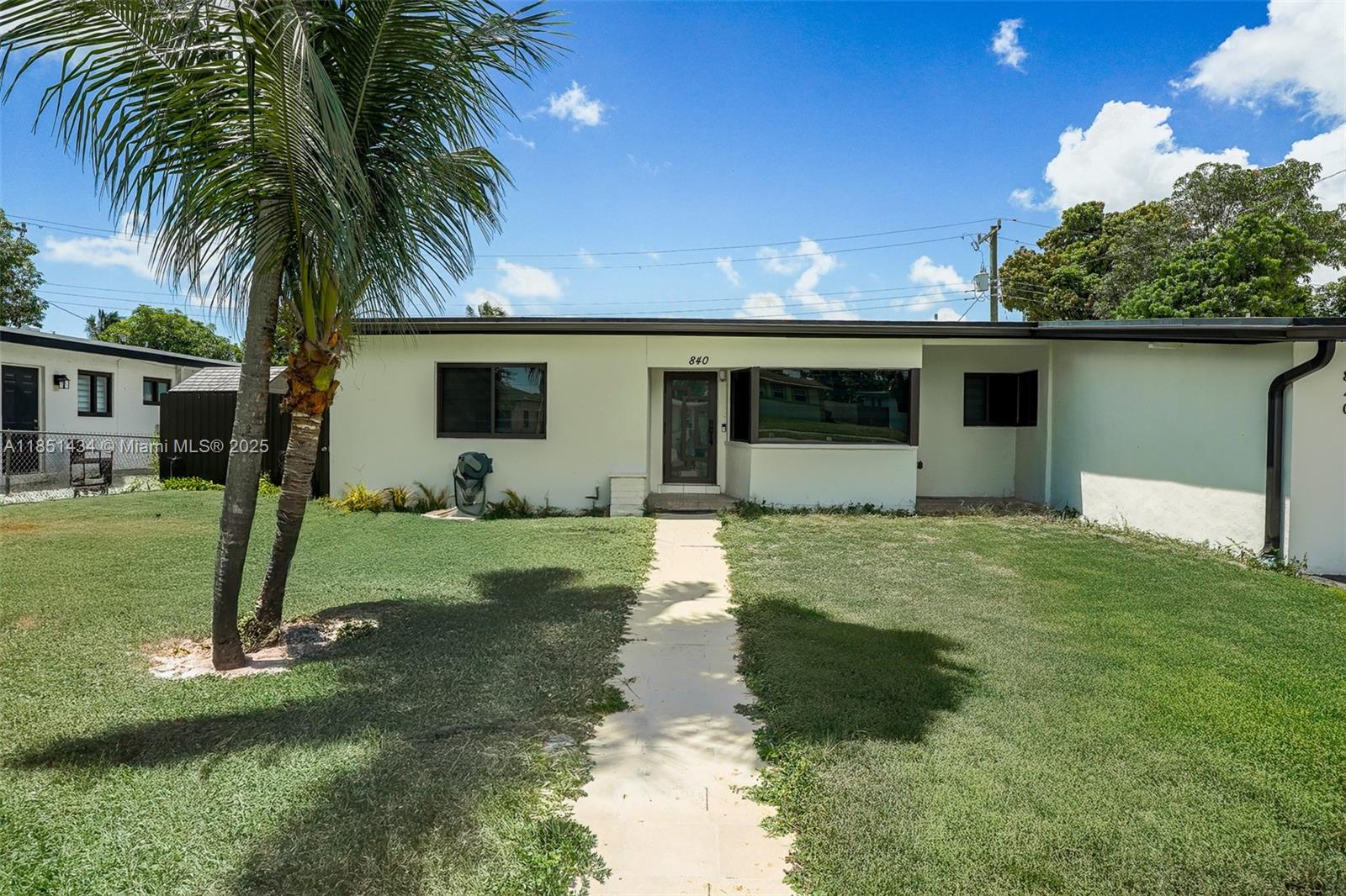 Ready for move-in! Discover this beautifully updated 3-bedroom, 2-bath single-family home in Miami Gardens, just minutes from Hard Rock Stadium, shopping, dining and major highways like I-95 and the turnpike. The home features stunning white porcelain tile throughout, a modern kitchen with stainless steel appliances and wine cooler, impact windows, central A/C and in-unit washer/dryer. Spacious layout with 2 parking spaces in the driveway and a fenced backyard with a private pool—perfect for relaxing or entertaining! Pets welcome with deposit. Rental payment includes pool maintenance; tenant responsible for patio and front yard upkeep. Quick approval and fast move-in with first, last and security deposit. Easy to show—call listing agent for appointment and details! Will not last, act now!