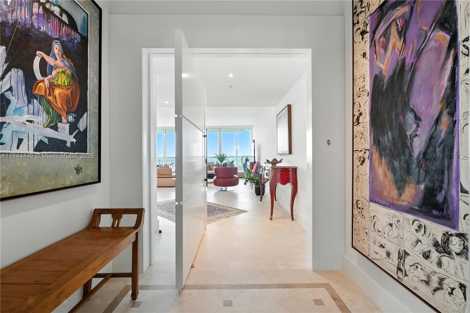 Old World Charm Meets Modern Luxury. Welcome to prestigious Santa Maria, where timeless elegance blends with contemporary living. 2,100 sq ft of refined interiors, featuring expansive living spaces & a wraparound balcony with breathtaking sunset & city views. Recently remodeled unit with sleek Mia Cucina cabinetry & top-of-the-line Gaggenau appliances. 2 bedrooms, 2.5 bathrooms, and a separate laundry room with service entrance for convenience. Features include travertine flooring throughout the living areas & wide plank oak floors in the bdrm. Floor-to-ceiling windows offer stunning vistas from every room. Residents enjoy world-class amenities. Such as gym, a children’s play area, Pilates room, community room, concierge, valet and soon to be completed resort like pool & tennis courts.