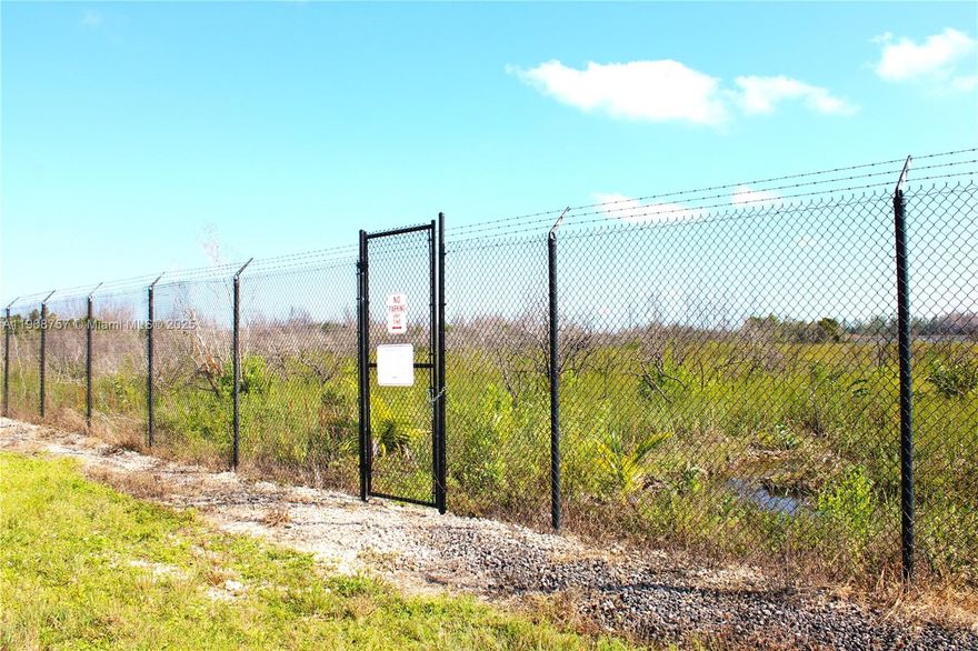 Welcome to your own private oasis on the way from Miami to the Florida Keys! This 30,056.4 Sq.Ft vacant lot comes with a canal at the back, providing stunning water views and endless opportunities for possible future outdoor opportunities. The property is securely gated, offering peace of mind and privacy for you and for your investment. The busy road that crosses in front of the property provides convenient access to nearby amenities and attractions, making this an ideal location for those who enjoy the hustle and bustle of city life. Don't miss out on this rare opportunity to own a piece of paradise in one of the most sought-after locations in South Florida. Come see it for yourself and make this dream investment a reality today!