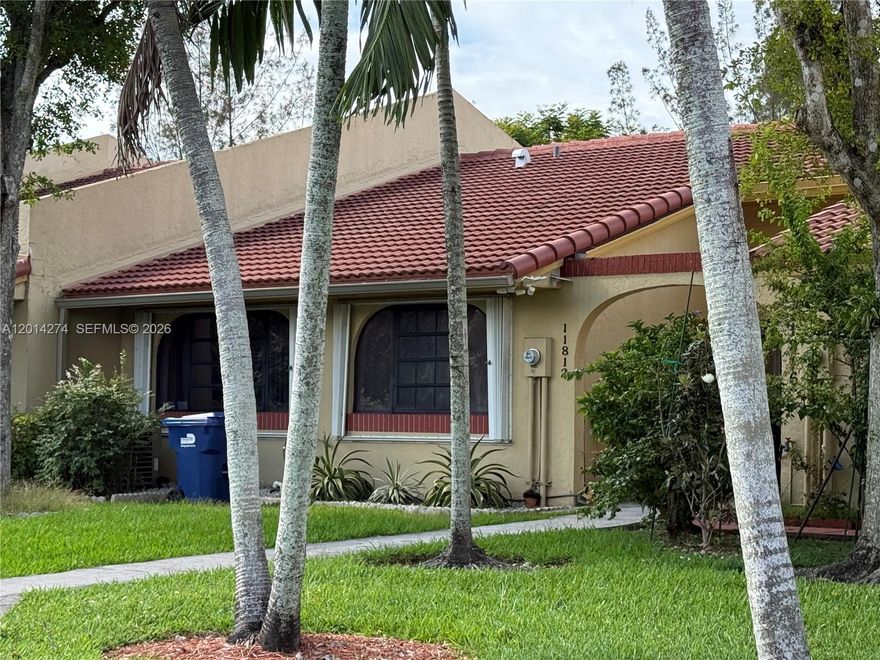 Excellent Location!! Beautiful, nice and clean, well kept townhome in a secluded exclusive community. brand new roof, improved doors, wide living room, open kitchen with breakfast. All appliances with extended limited warranty. Parking spaces in front of the house with visitor and disabled accessible spaces. The large enclosed terrace is seeing the green garden to the private backyard. There is strong storage shed that can be used for multiple purposes. The super low association maintenance fee includes car gate electronic access service,  the community pool, lawnmower front yard and trees. Well access to the main routes, Turnpike, Kendall Drive 117 Avenue, close to Town and Country Mall, hospitals, theatre, restaurant and professional centers