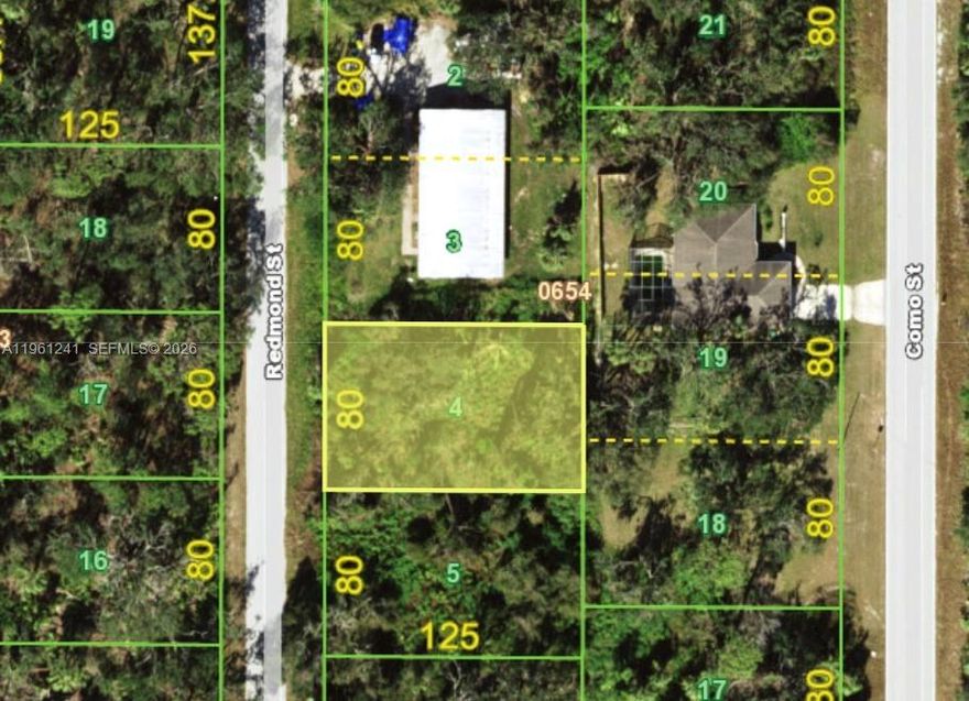 1974 Redmond St, Port Charlotte, Florida. OMI-zoned vacant parcel located at 1974 Redmond Street in Port Charlotte, offering a standard approximately 10,000 sq ft footprint (about 80 x 125). Located in an X flood zone, offering added peace of mind and favorable insurance considerations. Suitable for office, medical, or institutional use, this lot is positioned in an established area with surrounding residential and professional uses. Convenient access to major roadways, nearby hospitals, shopping, and services makes this a practical site for a small professional building or future development. A solid opportunity for investors or end users seeking flexible zoning in a growing Port Charlotte corridor.