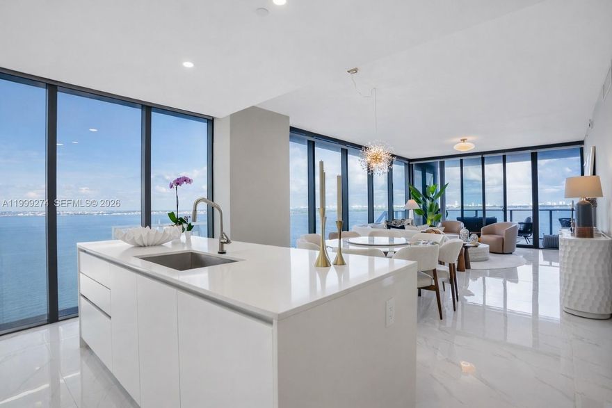 Amazing corner unit featuring four bedrooms, five full bathrooms, and one half bath at Aria Reserve, one of Miami’s premier waterfront condominiums. This fully furnished residence offers 2,663 SF of interior space plus 291 SF of terraces, with a spacious and functional layout designed to maximize natural light and seamless indoor-outdoor living. Expansive windows throughout enhance the open feel of the residence. The interior features quality furnishings and refined finishes, ideal for a turnkey lifestyle. Each bedroom offers generous space and privacy. Aria Reserve provides world-class, resort-style amenities and a prime waterfront location minutes from the Design District, Wynwood, Downtown Miami, and Miami Beach. An excellent opportunity to enjoy luxury waterfront living.