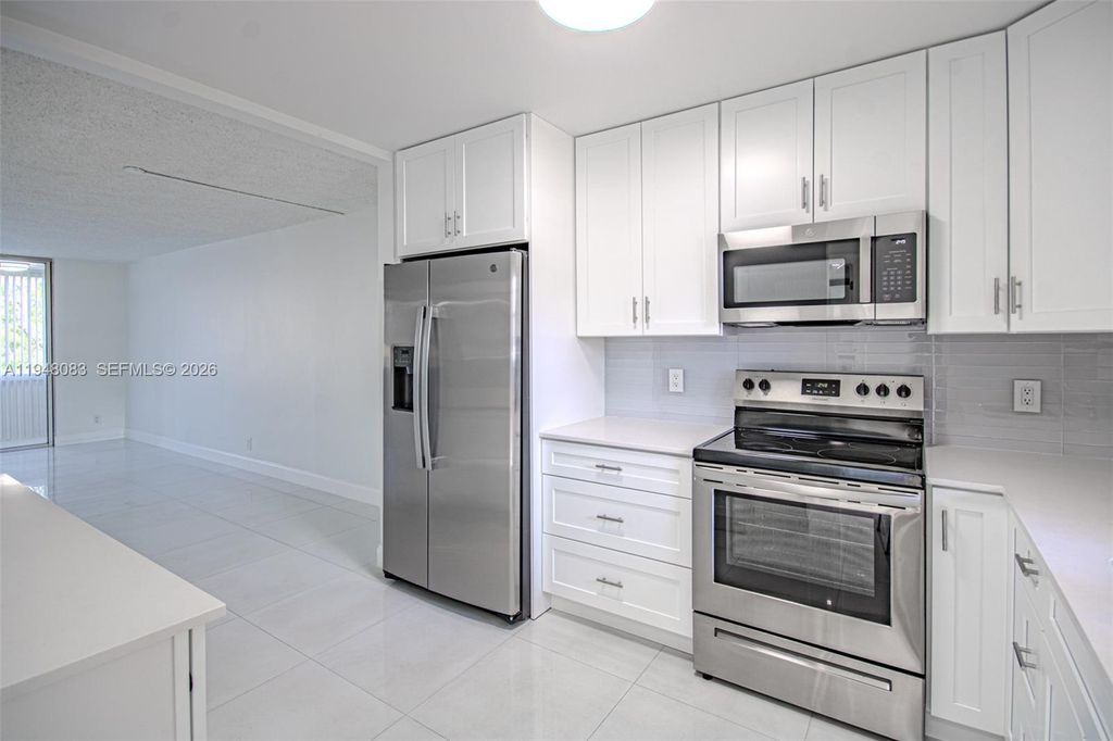 Photo of 2541 Aragon Blvd #105, Sunrise, FL 33322 (MLS # A11948083)