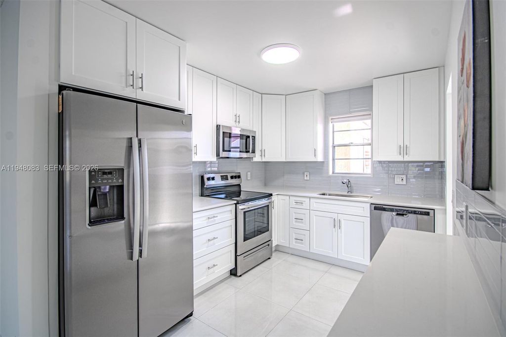 Photo of 2541 Aragon Blvd #105, Sunrise, FL 33322 (MLS # A11948083)