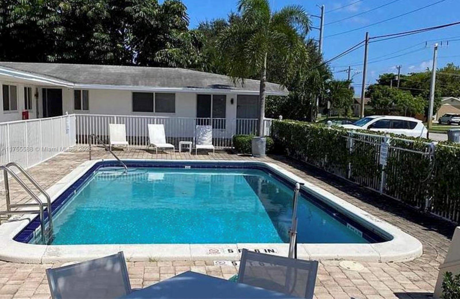 GREAT INVESTMENT OPPORTUNITY 8-UNIT MULTI-FAMILY (plus a small office room for short term renters) IN THE HEART OF POMPANO BEACH. ~ 3.5 MILES TO THE BEACH. RENOVATED BUILDING W/FENCED IN POOL, Two 2/1's and Six 1/1's with all updated interior and exterior, new roof and beautiful swimming pool area, impact doors and window, fenced pool, etc... Plenty of parking and guest parking. Fully tenant occupied with annual leases. Kitchens have stainless steel appliances, granite countertops and cherry wood cabinets. Property under 24/7 security camera. Cap Rate: 5.70%, NOI: $116,220.36. Income: $168,000. Don’t miss this opportunity!