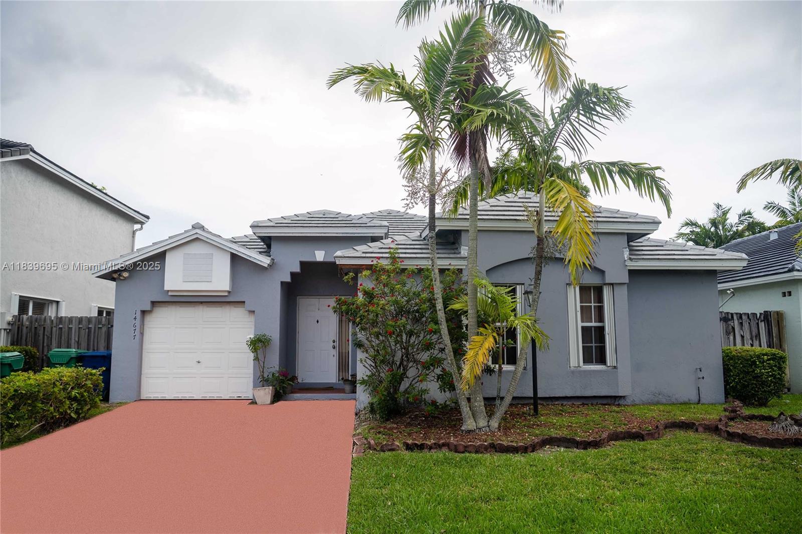 Welcome to Deerwood — a beautifully maintained single-family home in the highly desirable Miami-Dade community! This move-in ready home features a brand new roof and full accordion shutters, offering peace of mind during hurricane season. Inside, you’ll find elegant marble flooring throughout, an upgraded kitchen with modern appliances, and a spacious primary suite with a walk-in closet, glass enclosed shower, and a stand-alone soaking tub. Enjoy the convenience of a Samsung washer and dryer and an automatic garage door opener for your one-car garage. Located near the Florida Turnpike for easy commuting, this walkable, friendly neighborhood is perfect for families seeking comfort and convenience. Close to Zoo Miami, parks, great schools, plus nearby shopping and dining options!