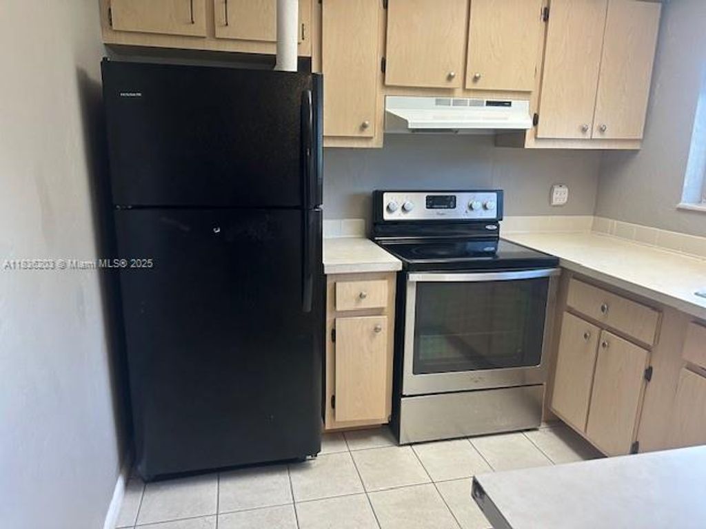 Photo of 5252 Bosque Ln #9, West Palm Beach, FL 33415 (MLS # A11836203)