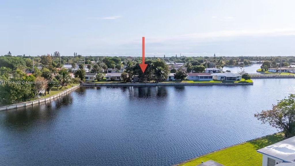 Photo of 5817 NW 70th Ave, Tamarac, FL 33321 (MLS # A11874926)