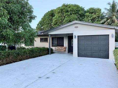 Photo of 5817 NW 70th Ave, Tamarac, FL 33321 (MLS # A11874926)