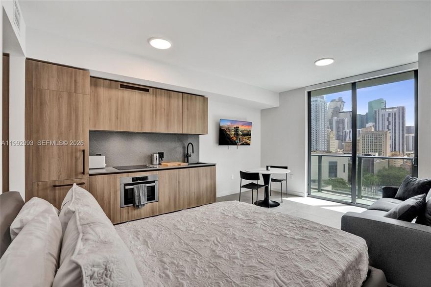 Excellent investor opportunity! This brand-new furnished studio in Downtown Miami can be rented daily. Located in modern 501 First building, just steps from the Metromover, with easy access to Brickell, Miami Beach, and major highways. This contemporary unit features modern finishes, new appliances with washer and dryer included, and an efficient layout. Enjoy living in a luxury building in the heart of the city, close to restaurants, shopping, and entertainment. Amenities include 75-foot resort-style rooftop pool, state-of-the-art fitness center, yoga/meditation area, sunrise and sunset terraces with city views, greenhouse lounge, co-working spaces, pet lounge with pet-washing station, and more! Perfect for convenient urban living.