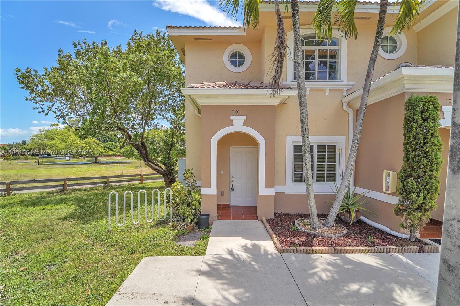 MOVE IN WITH FIRST MONTH ONLY!
Corner condo with the feel of a townhome in Tropical Landings with Lake views and natural light. Features a brand new washer/dryer and stovetop/ oven. Open, airy living room, plus a patio on the first floor and balcony on the second. Shutter panels included. Enjoy a spacious green park and serene lake right in your backyard. Two parking spots included. Move-in ready and in great condition!
Contact Taylor Mazloum 786-326-8604 for questions and showings.