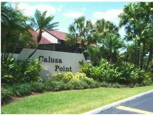 !! GORGEOUS TOWNHOUSE IN THE DESIRABLE GATED COMMUNITY OF CALUSA POINT !! * NEW KITCHEN WITH GRANITE COUNTERTOPS * REMODELED MASTER BATHROOM WITH MARBLE FLOORS * VOLUME CEILINGS * TILED THROUGHOUT ON FIRST FLOOR *LAMINATED WOOD FLRS ON 2ND FLOOR *FAMILY ROOM * SPACIOUS BEDROOMS * SCREENED PATIO * ACCORDIAN SHUTTERS * ALARM... !! ENJOY ALL AMENITIES, POOL, CLUBHOUSE, PLAYGROUND, TENNIS COURTS, GUARD AT GATE W/ 24 HR SECURITY. CLOSE TO SHOPPING CENTERS, RESTAURANTS, A RATED SCHOOL, FL TURNPIKE & MORE...!!