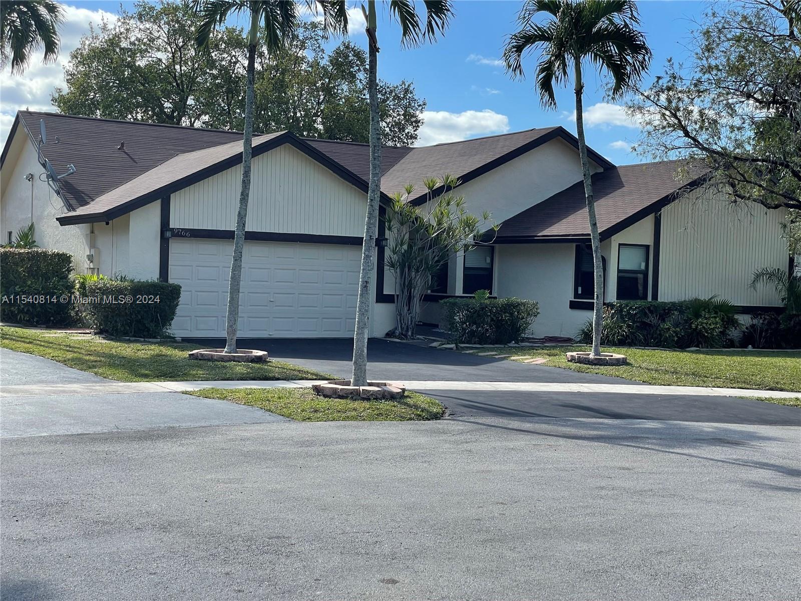 9766 Nw 41st St St, Sunrise, Miami-Dade County, Florida - 3 Bedrooms  
2 Bathrooms - 