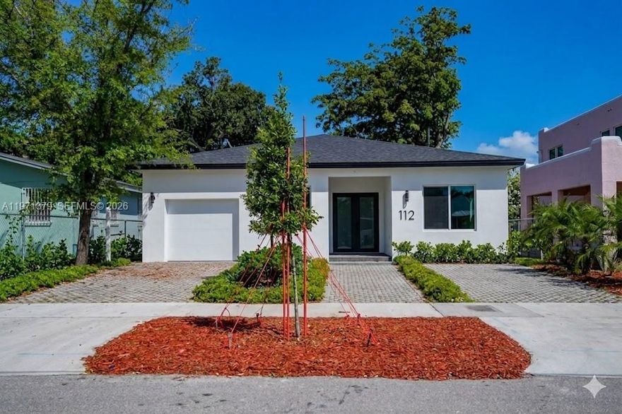 STUNNING NEW CONSTRUCTION 4-bedroom, 3-bathroom residence offers a perfect fusion of luxury and central convenience, placing you just moments from Miami International Airport, the Health District, and both the Marlins and new Inter Miami stadiums. Ideal for families, professionals, or investors, the home boasts an airy open-concept layout defined by soaring 10-foot ceilings, generously sized bedrooms with massive closets, and elegant, spa-like bathrooms. The interior flows effortlessly onto a covered terrace designed for entertaining, which overlooks an expansive backyard complete with a private, relaxing spa tub.