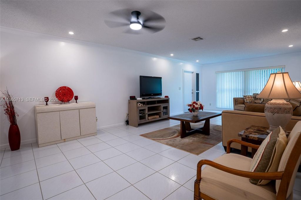 Photo of 10198 Dovewood Ln #A, Boynton Beach, FL 33436 (MLS # A11965713)