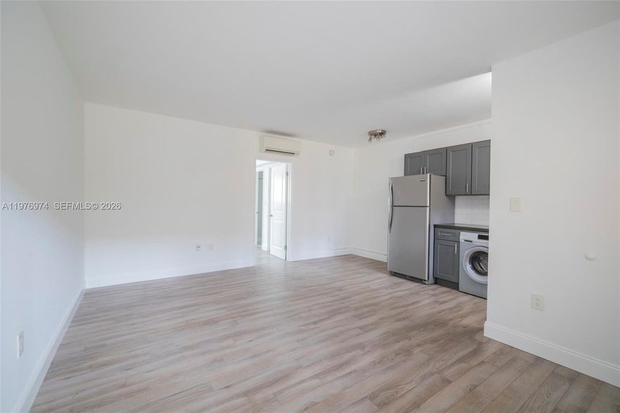 Modern 1-bed / 1 bath garden-style condo east of US-1 in South Miami. First-floor unit with no stairs. Fully renovated with ceramic wood-look floors, updated bathroom, and modern kitchen featuring subway tile backsplash, gas stove, and butcher block countertops. Spacious walk-in closet and washer/dryer in unit. Quiet, private building with a beautiful pool. 1 assigned parking space plus ample guest parking. Prime location minutes from Baptist Health, Sunset Place, MetroRail, Dadeland Mall, and the University of Miami.