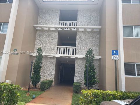 Photo of 7480 Miami Lakes Dr #G205, Miami Lakes, FL 33014 (MLS # A12042626)