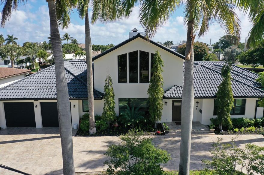 Experience waterfront luxury at its finest in this completely remodeled 3-bedroom, 3.5-bath home with a loft, nestled on a desirable corner lot in Lighthouse Point, Florida. This stunning residence offers the ultimate South Florida lifestyle with a private pool and a 150-foot dock complete with a brand new boat lift, perfect for the avid boater.  Enjoy quick access to some of the area's best fishing, with the Lighthouse Point inlet just 10 minutes away.  Peace of mind comes standard with hurricane impact doors and windows throughout. The meticulously remodeled interior showcases high-end finishes and a sophisticated design, creating an elegant and comfortable living space. Don't miss this opportunity to own your slice of paradise!