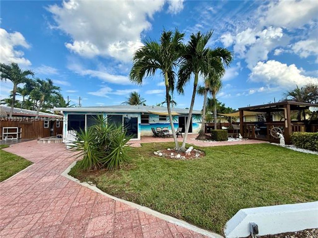 Photo of 201 SE 3rd Ave, Pompano Beach, FL 33060 (MLS # A11983374)