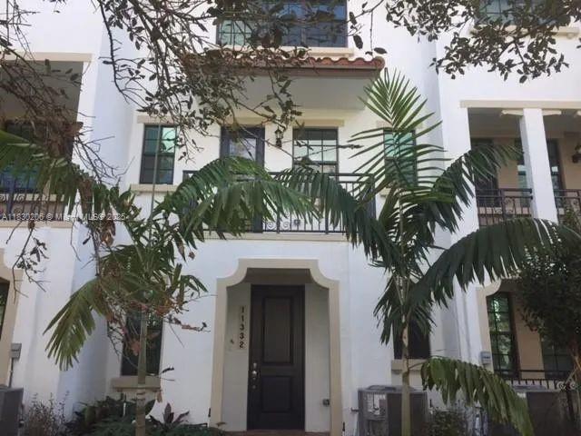 Beautiful 3-bedroom, 3.5-bathroom townhouse located in a gated community in Pembroke Pines. This home features granite countertops, stainless steel appliances, and a private balcony overlooking a lush garden—perfect for relaxing or studying. The first floor includes a spacious room with its own entrance and bathroom, ideal for a home business, office, or studio. Includes a two-car garage and is zoned for Flanagan High School. Located just steps from Aldi, Wawa, and more, with easy access to daily conveniences. Garden-front location is great for walking or enjoying time outdoors.