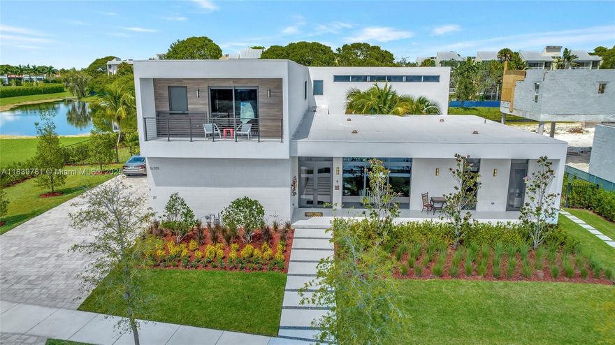 Welcome to the Modified O3A Model Residence at Botaniko Weston—a stunning embodiment of modern-era grandeur, offering over 6,000 sq. ft. of refined living space in one of South Florida's most exclusive enclaves. This architectural masterpiece, a unique collaboration featuring the visionary design of Chad Oppenheim and the whimsical elegance of MacKenzie-Childs style, is nothing short of breathtaking. Every detail has been meticulously curated to elevate everyday living into an art form. With five ensuite bedrooms, six and a half bathrooms, a private media room, executive office, maid’s quarters, and a spacious three-car garage, this residence is designed to inspire. The chef’s kitchen stuns with an oversized quartz island, and top-tier appliances. With over half an acre land, pool and spa