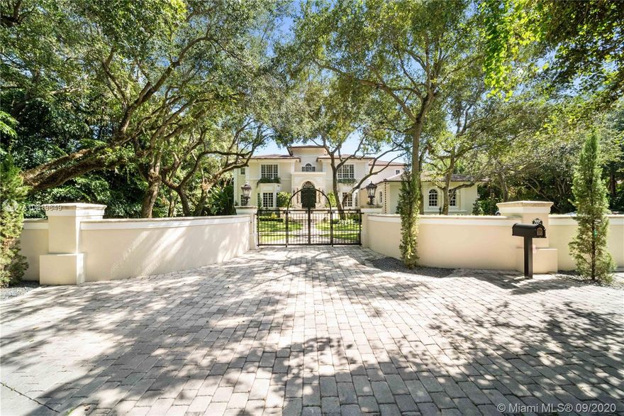 Amazing opportunity to own a Classic Estate tucked away down a beautiful hidden road in Ponce Davis. This home is an architectural masterpiece surrounded by mature oaks on almost an acre lot. Privacy wall and gate lead you to a grand foyer entrance with an elegant staircase. Marble floors and high ceilings throughout. Home is in impeccable condition with top of the line finishes. New kitchen done with no expense spared, oak cabinets, Taj Mahal Stone, Wolf and Subzero appliances, Butler's Pantry. Newly renovated salt water pool and jacuzzi. 7 spacious bedrooms & 7.5 baths, two covered terraces, Mohagony office, Guest Suite & Maids Qtrs. Upstairs Grand Master with Private Office. Master bath completely remodeled equipped with steam shower. 2017 Roof and Cat 6/ Cisco Systems.