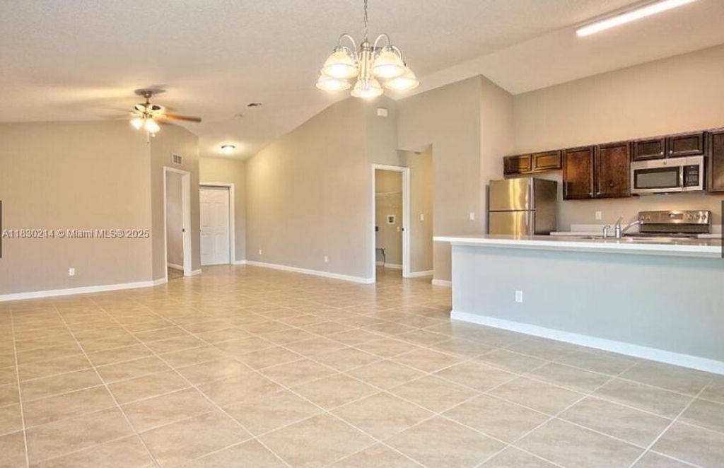 Photo of 3574 SW Masilunas St, Port St Lucie, FL 34953 (MLS # A11830214)