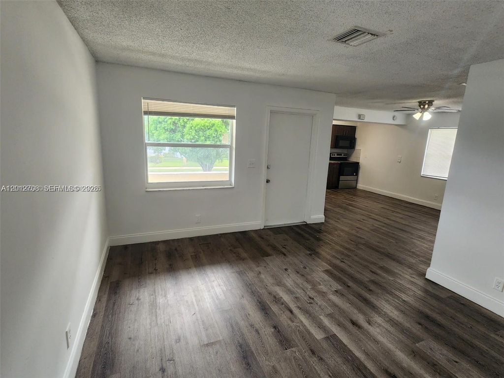 Photo of 4117 Woodside Dr #4, Coral Springs, FL 33065 (MLS # A12012708)