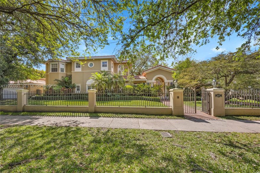 Nestled in the heart of South Gables, this stunning 5,688 sq ft estate offers 5 bedrooms and 4.5 baths on a spacious corner lot. The gated property features impact windows and doors, ensuring both security and peace of mind. Inside, you’ll find two expansive family rooms and a beautifully updated oversized kitchen equipped with top-of-the-line appliances, perfect for everyday living and entertaining.

The primary suite is a true retreat, occupying the entire second floor with a large walk-in closet, a luxurious bathroom, and a private balcony overlooking the landscaped pool and patio area. Additional highlights include in-law or maid’s quarters, a covered patio ideal for outdoor gatherings, a 2-car garage, and abundant storage throughout.

Conveniently located near top-rated public and private schools, this exceptional home combines comfort, space, and prime location.