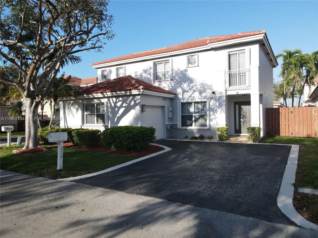 Photo of 529 NW 47th Way, Coconut Creek, FL 33063 (MLS # A11993154)