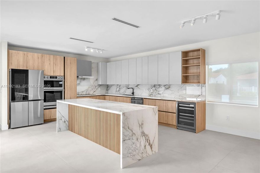 Perfectly positioned on a large corner lot in the heart of Shenandoah, this stunning high-ceilings residence blends timeless charm w/ modern sophistication. Originally built in 1990, it has been completely renovated from top to bottom, featuring a brand-new roof, high-impact windows and doors, and premium designer finishes throughout. Spanning 2,673 square feet, the thoughtfully designed split floor plan includes 4 spacious bedrooms and 3.5 bathrooms. Two-car garage, and a private driveway. Flooded with natural light and surrounded by lush landscaping, the home exudes warmth and style. Located across from Bryan Park, this property offers exceptional curb appeal and comfort just minutes from Coral Gables, Coconut Grove & Brickell. Video tour available!