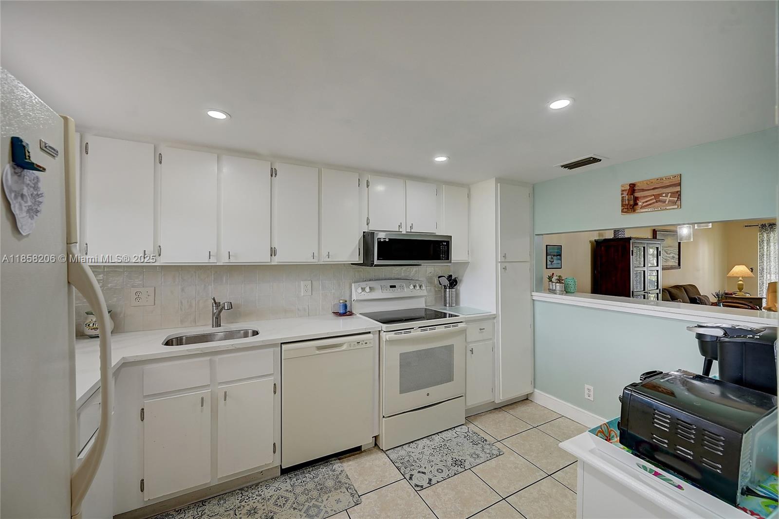 POINCIANA LAKES CONDO - Residential