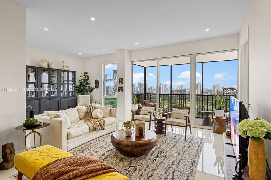 This exquisitely renovated 27th-floor Penthouse unit features 2 bedrooms and 2 baths, offering breathtaking panoramic views of the Turnberry Golf Course, Intracoastal, and ocean. With luxurious finishes throughout, this residence, this unit has been completely renovated. Additionally, a brand-new AC system. The wall of the second bedroom has been removed; the Seller is amenable to reinstating it prior to closing. This community has upgraded elevators, a revitalized lobby, and enhanced hallways. Additionally, it has successfully completed its 40-year certification. Residents can enjoy resort-style amenities, including a fully-equipped fitness center, sauna, heated pool, jacuzzi, and 24-hour security services. Cable and internet included in the HOA.