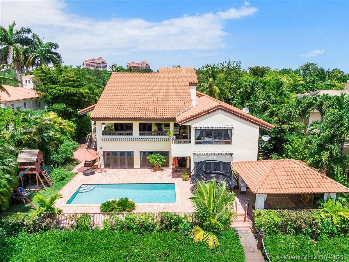 "Waterfront property in Cocoplum, one bridge to bay. 6 bedrooms, 6.5 baths. Versatile plan each with its own living area, bedroom/bath and kitchen. Unobstructed open bay views thanks to consistently maintained mangroves. Additional features include gas powered stove, washer and dryer; impact windows, tiled roof gazebo, generator, movie room, steam shower option in upstairs master bath with Kohler double shower heads and rain effect Kohler tiles. Personalize this Cocoplum living opportunity with your handpicked additional upgrades or enjoy as is with waterfront living. Conveniently located near Miami-Dade's best schools. Amenities include Cocoplum Islands Phase 2 tennis courts, basketball, club lap pool and social room, fitness center and 24hr security."