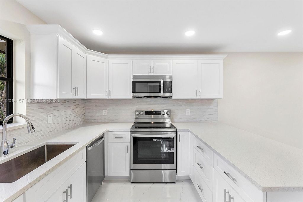 Photo of 7744 W Courtyard Run W, Boca Raton, FL 33433 (MLS # A12014157)