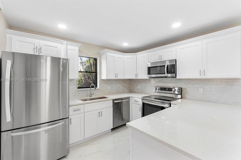 Photo of 7744 W Courtyard Run W, Boca Raton, FL 33433 (MLS # A12014157)