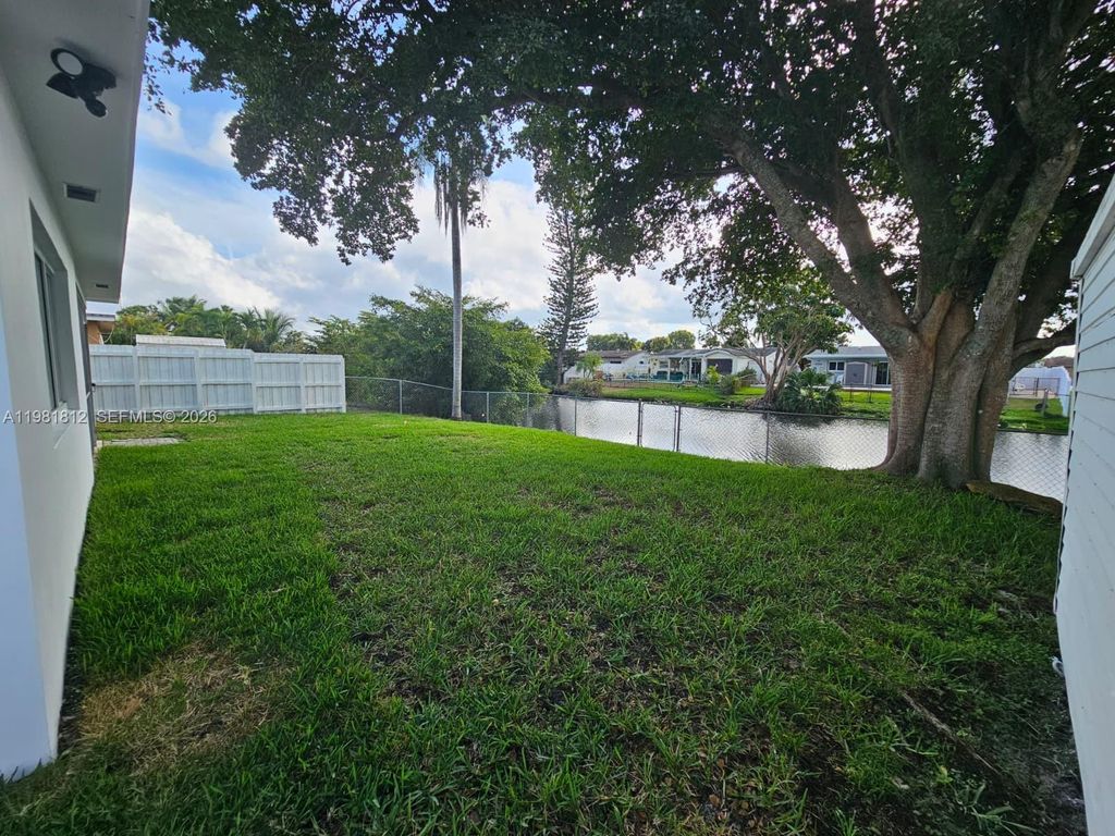 Photo of 11450 NW 32nd Pl, Sunrise, FL 33323 (MLS # A11981812)